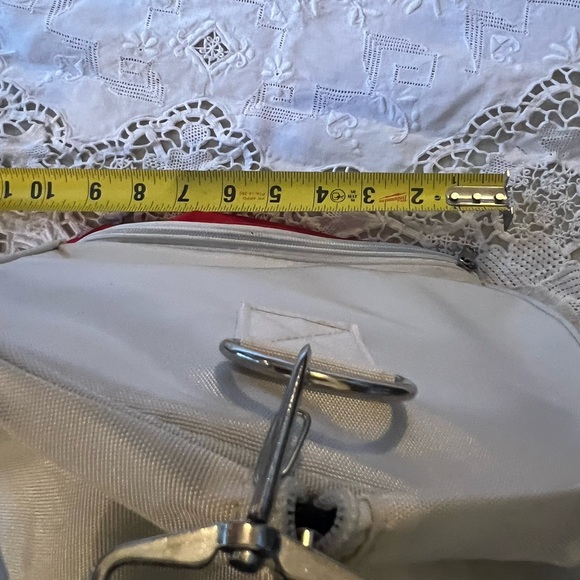 Guess white/cream colored, tote with extra red storage on the bottom. - Picture 3 of 7